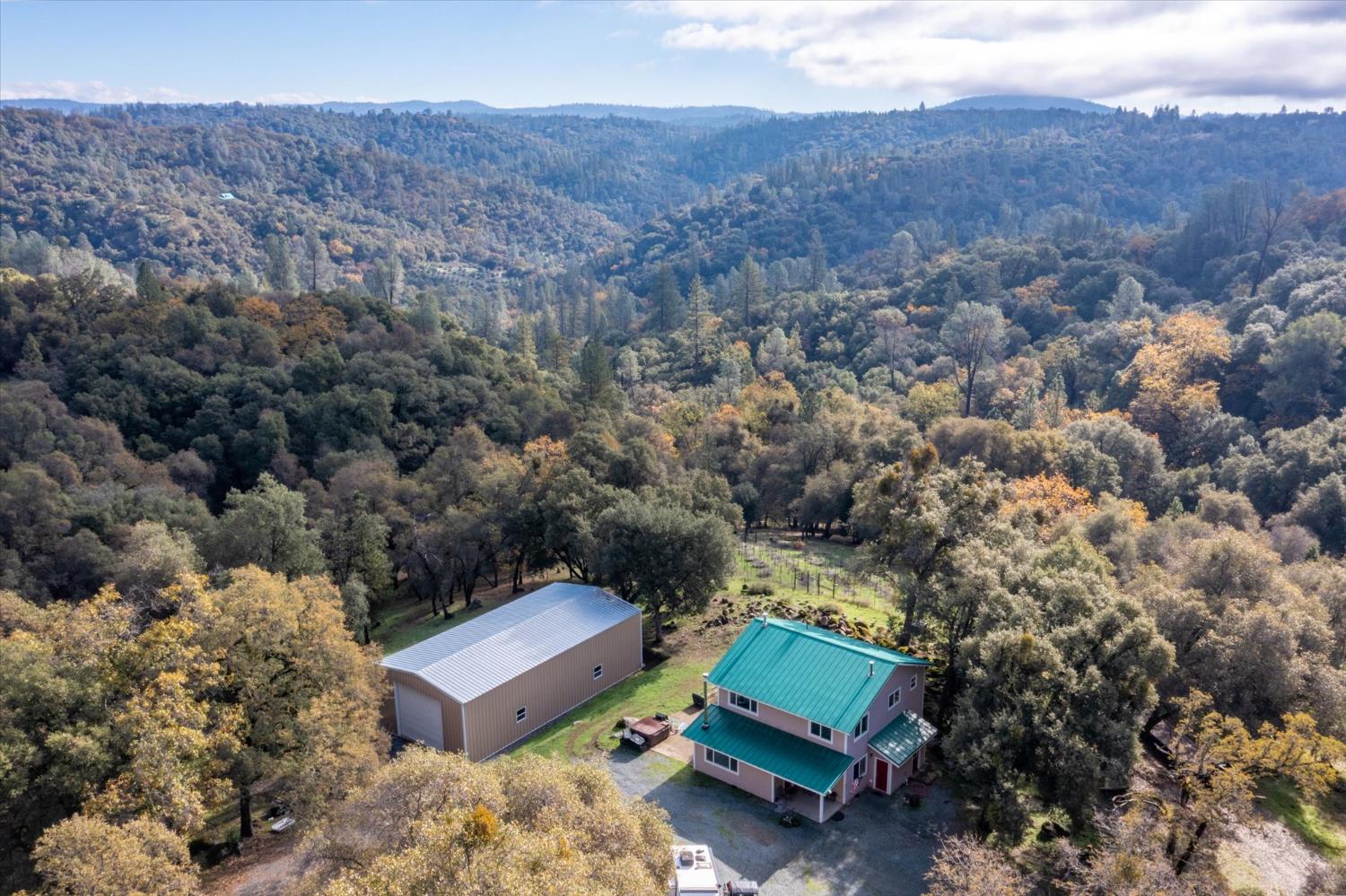 2870 Sand Ridge Road Placerville, CA 95667 - Photo 76 of 91 an aerial view of a house with a yard