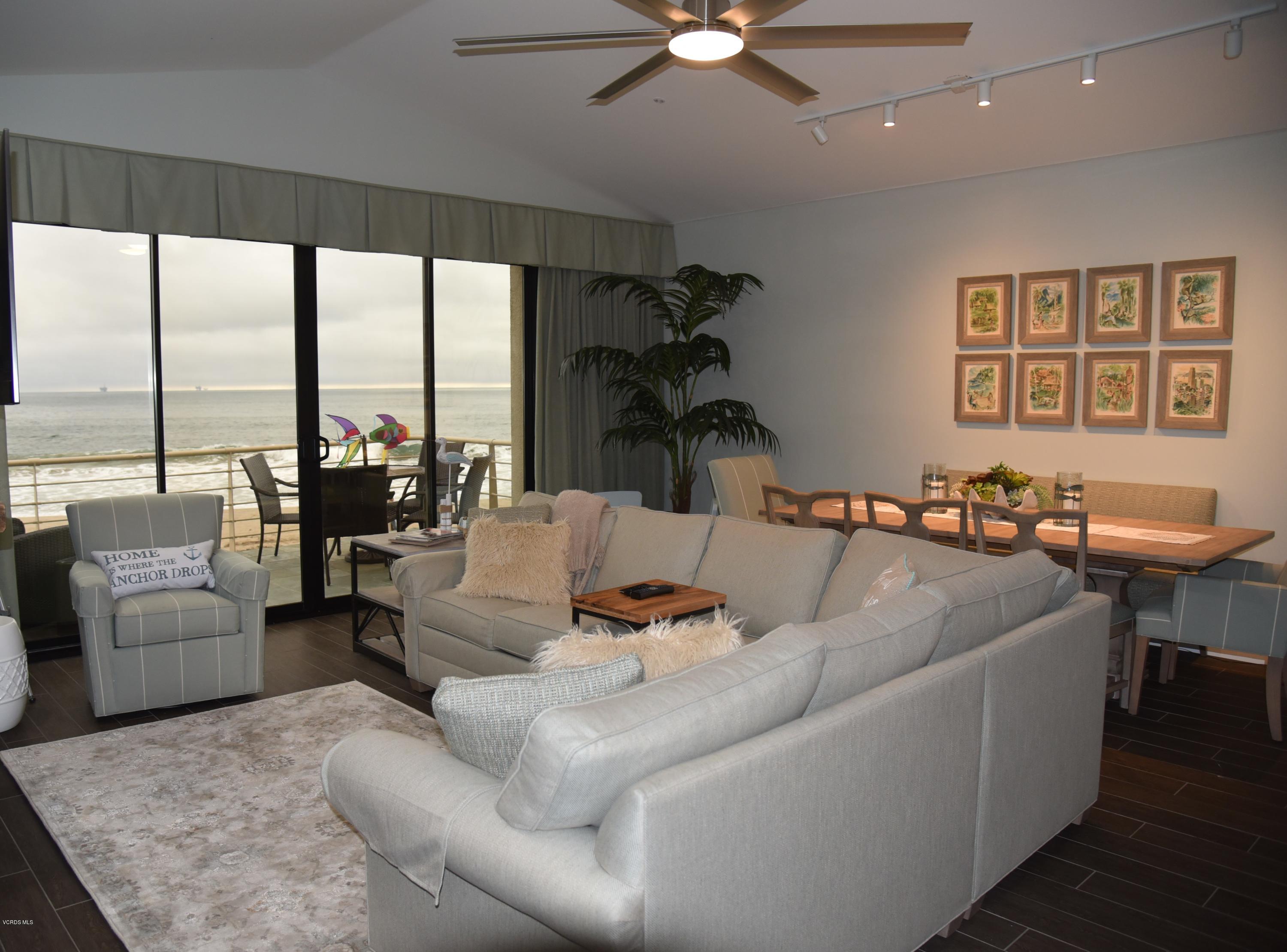 4885 Sandyland Road, Unit 2 Carpinteria, CA 93013 - Photo 4 of 39 a living room with furniture and a large window