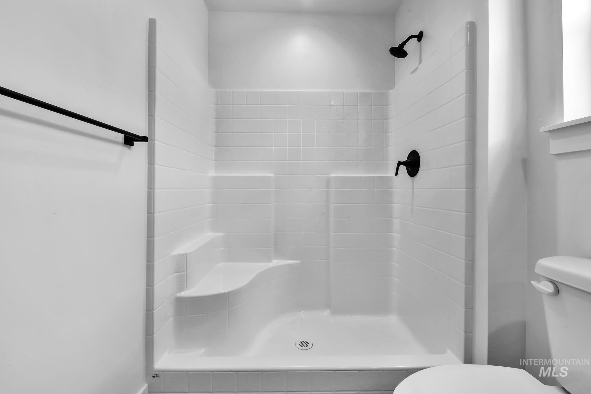 1160 Velvet Loop Wilder, ID 83676 - Photo 14 of 29 Bathroom featuring a shower stall and toilet