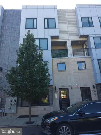a car parked in front of a building