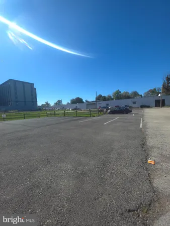 a view of a road with an ocean view