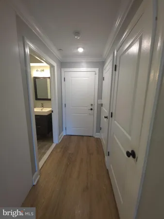 a view of entryway with bathroom