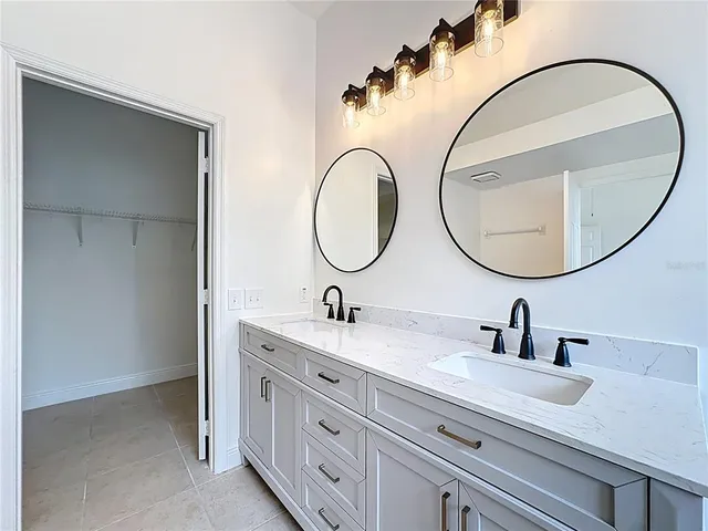 a bathroom with a shower and a window