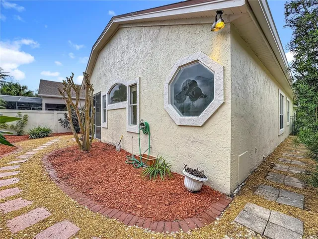 an aerial view of residential house with pool and yard