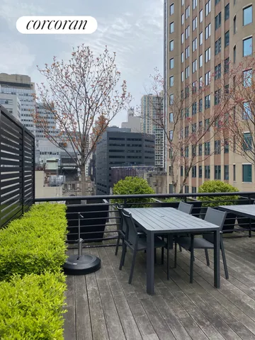 a view of a balcony with an outdoor space