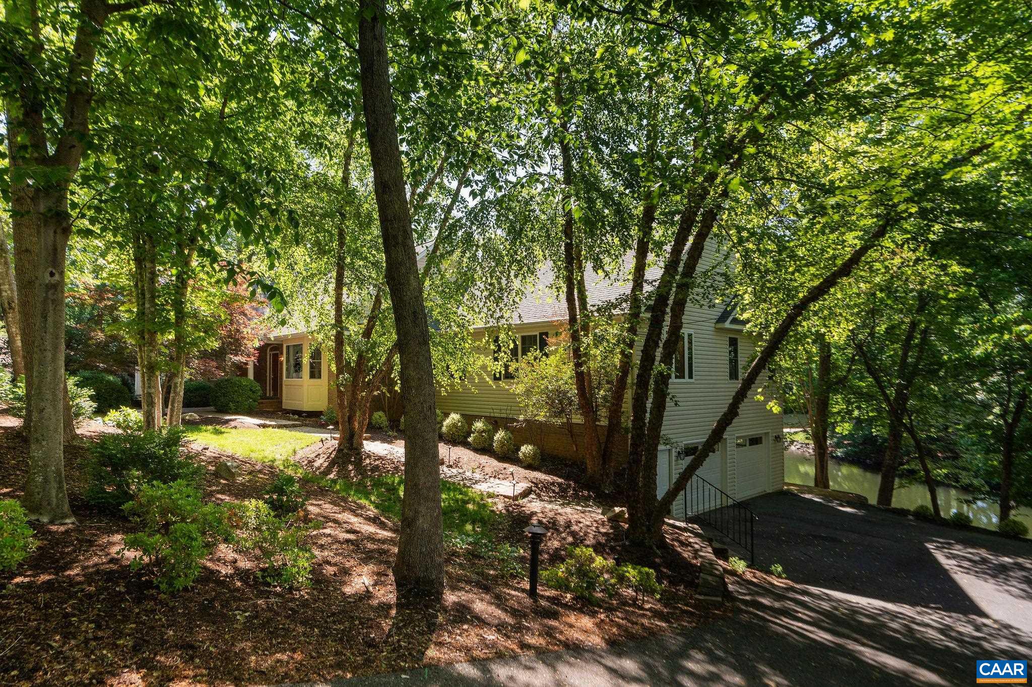 21 Amethyst Road Palmyra, VA 22963 - Photo 57 of 66 a view of a yard with plants and trees