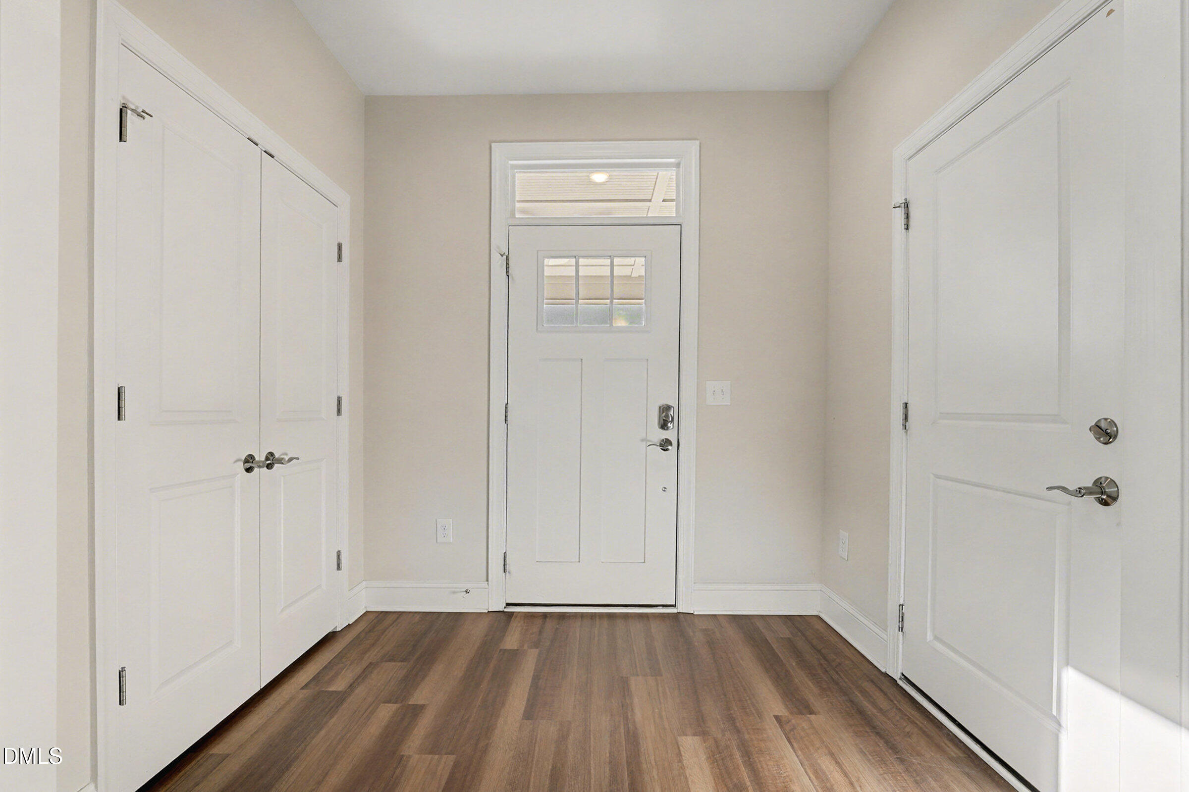 43 Davidson Street Clayton, NC 27520 - Photo 16 of 45 a view of an empty room with closet and a window