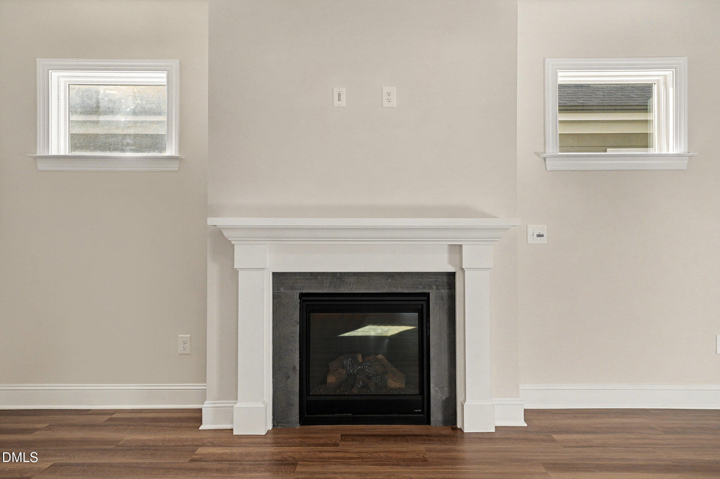 43 Davidson Street Clayton, NC 27520 - Photo 18 of 45 a white building with a fireplace