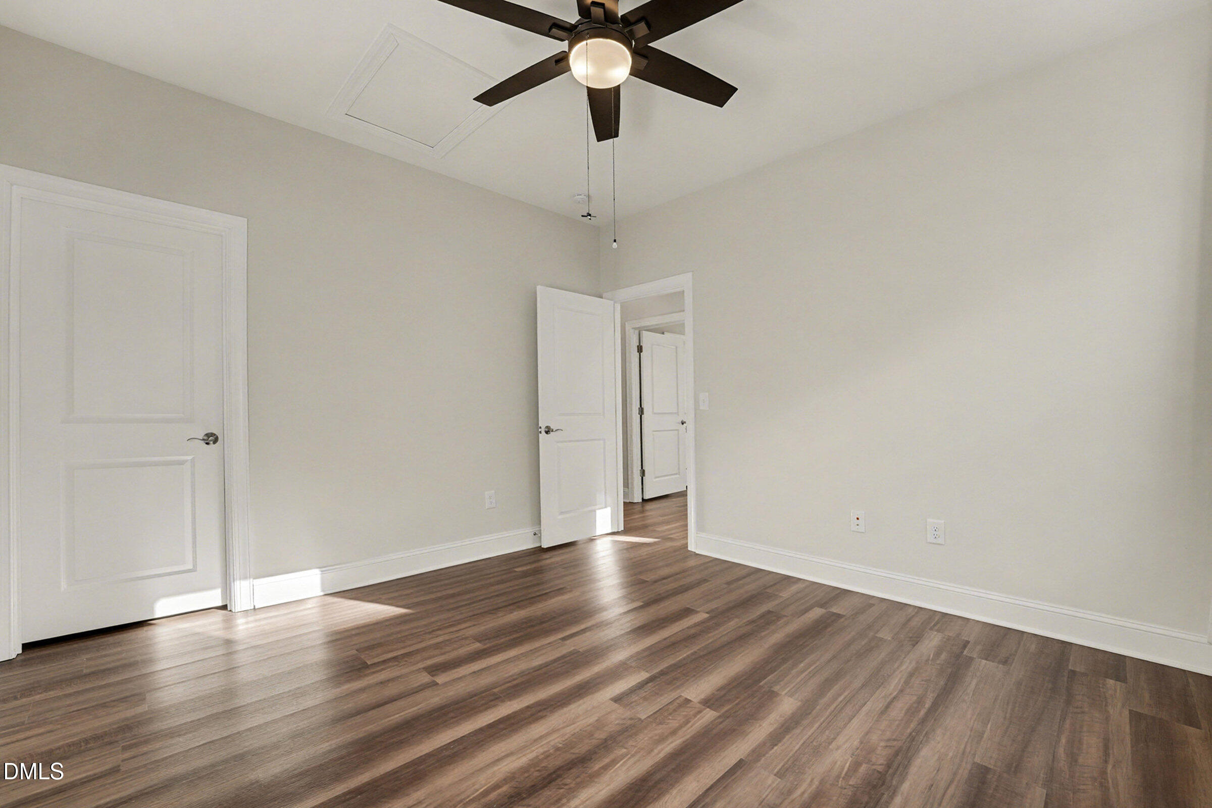 43 Davidson Street Clayton, NC 27520 - Photo 27 of 45 a view of an empty room with wooden floor