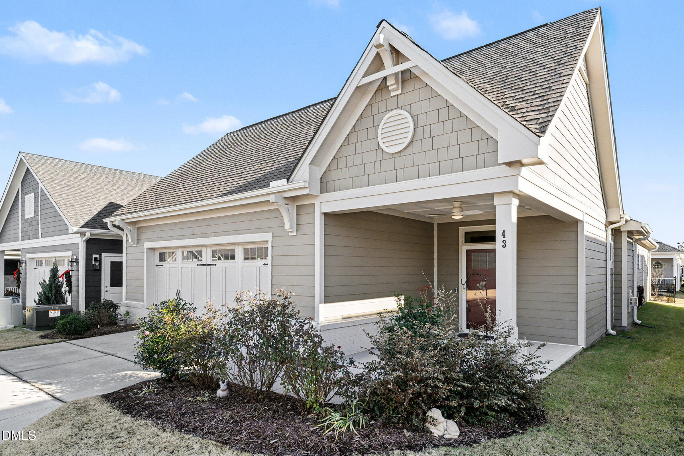 43 Davidson Street Clayton, NC 27520 - Photo 3 of 45 front view of a house with a small yard