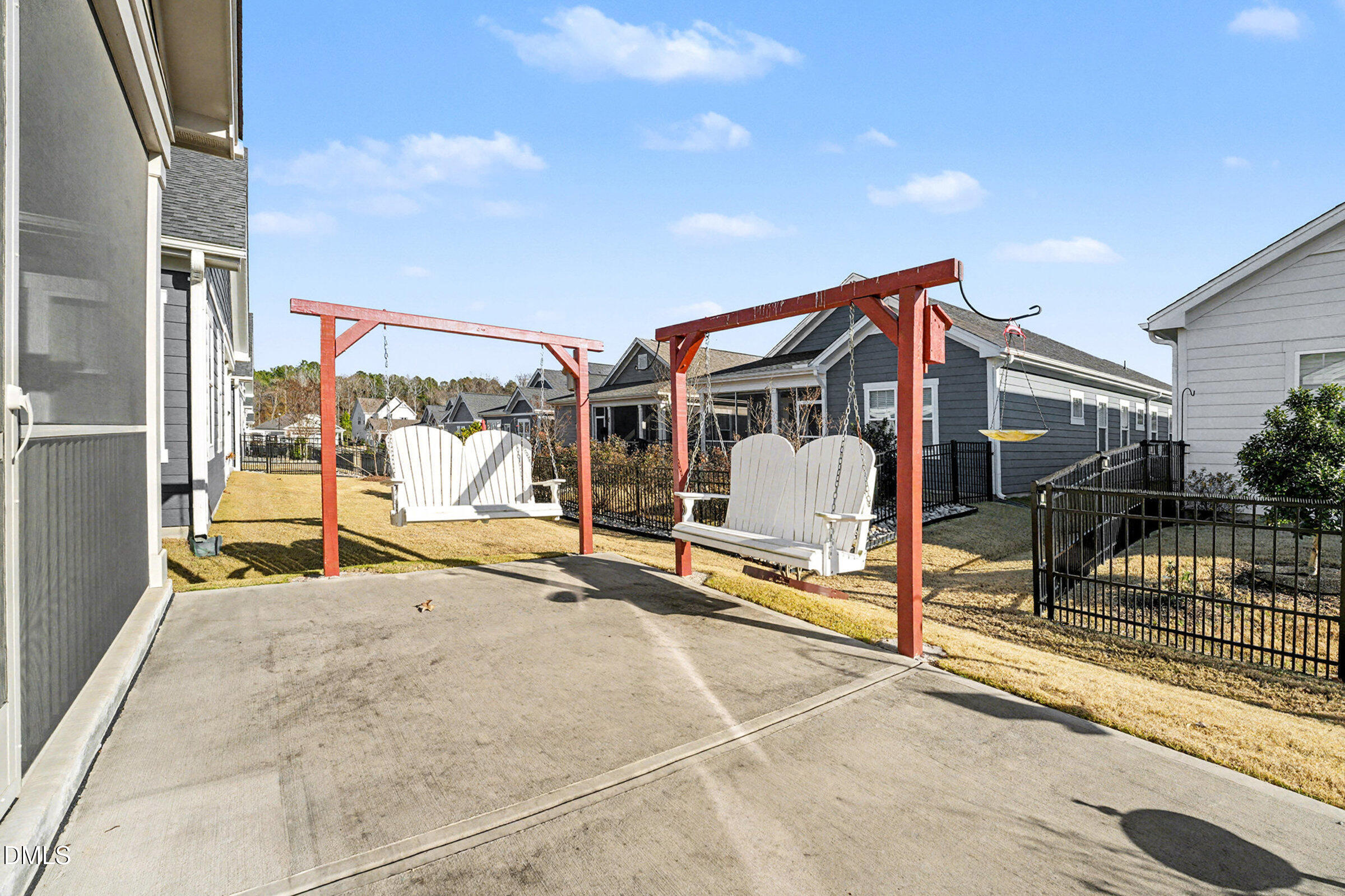 43 Davidson Street Clayton, NC 27520 - Photo 34 of 45 a view of a house with wooden floor and iron fence