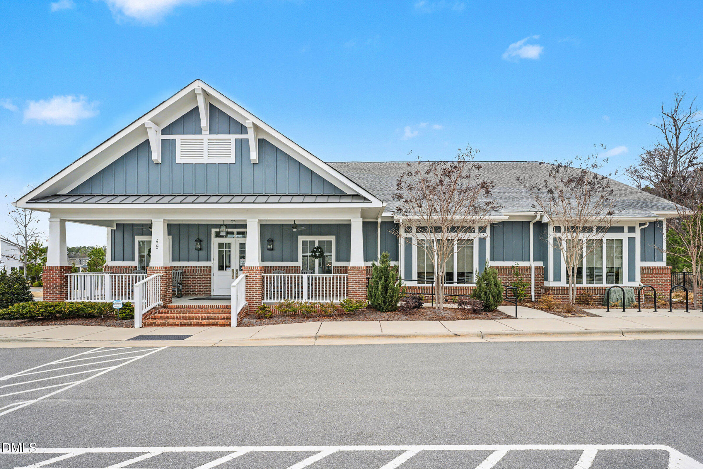 43 Davidson Street Clayton, NC 27520 - Photo 38 of 45 a front view of a house with a garden