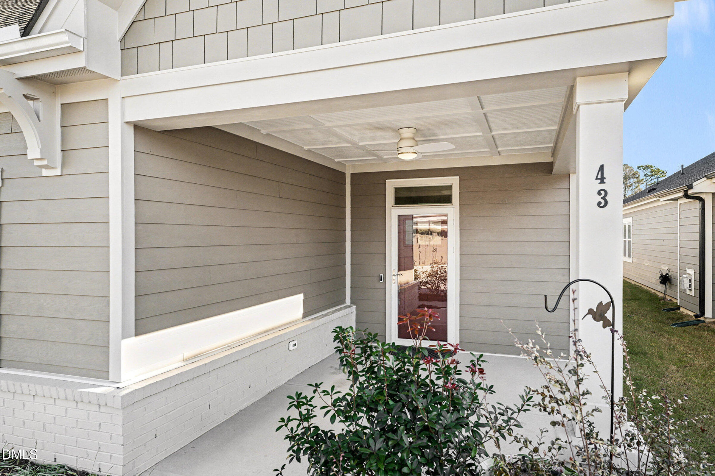 43 Davidson Street Clayton, NC 27520 - Photo 5 of 45 a front view of a house with a garage