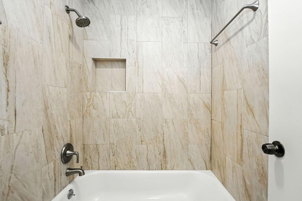 217 Tuxworth Circle Decatur, GA 30033 - Photo 17 of 38 a bathroom with a shower and a tub