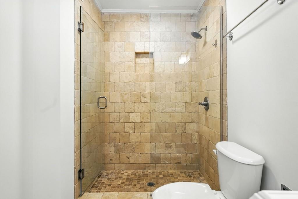 217 Tuxworth Circle Decatur, GA 30033 - Photo 24 of 38 a bathroom with a toilet and shower