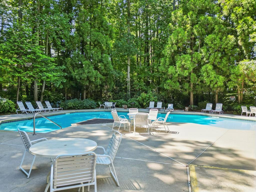 217 Tuxworth Circle Decatur, GA 30033 - Photo 32 of 38 a view of a swimming pool with a lounge chair