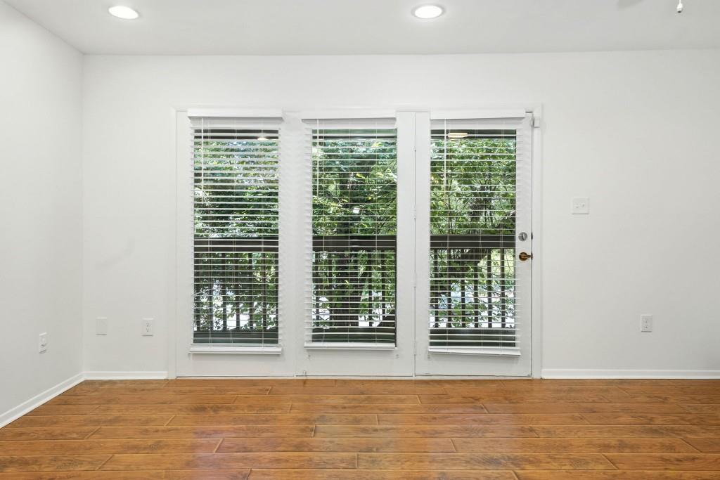 217 Tuxworth Circle Decatur, GA 30033 - Photo 10 of 38 a view of an empty room with a window