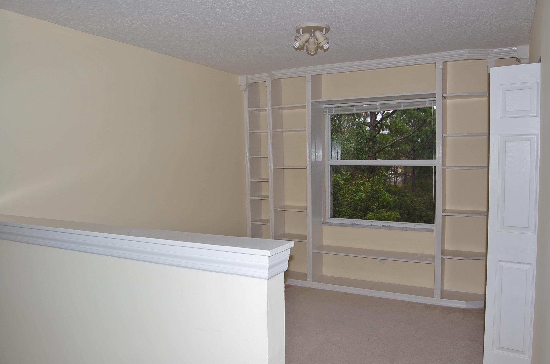 7196 Southeast Magellan Lane Stuart, FL 34997 - Photo 16 of 31 Bedroom 4 with 1/2 wall removed
