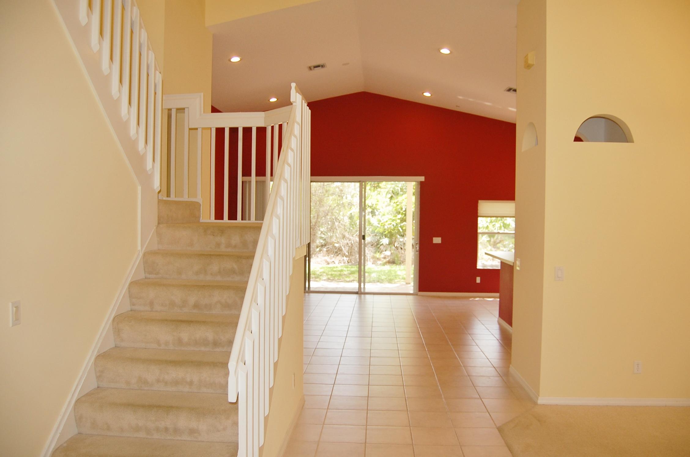 7196 Southeast Magellan Lane Stuart, FL 34997 - Photo 5 of 31 Stairs to upstairs bedrooms