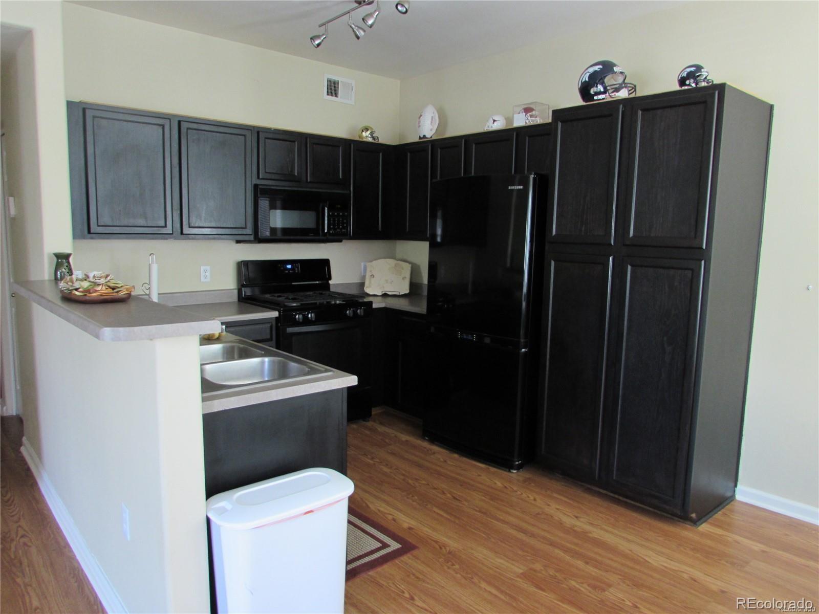 8468 South Thunder Ridge Way, Unit 104 Highlands Ranch, CO 80126 - Photo 2 of 18