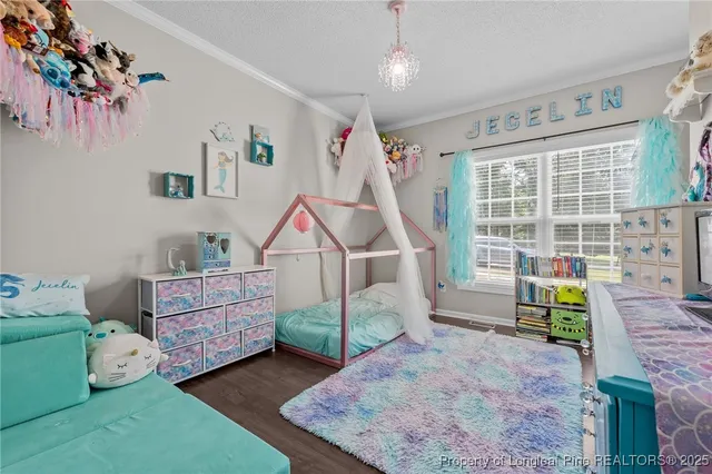 a view of livingroom with furniture and staircase