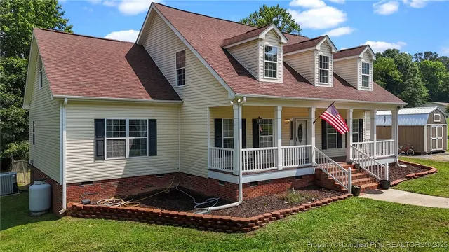 a view of outdoor space yard and front view of a house