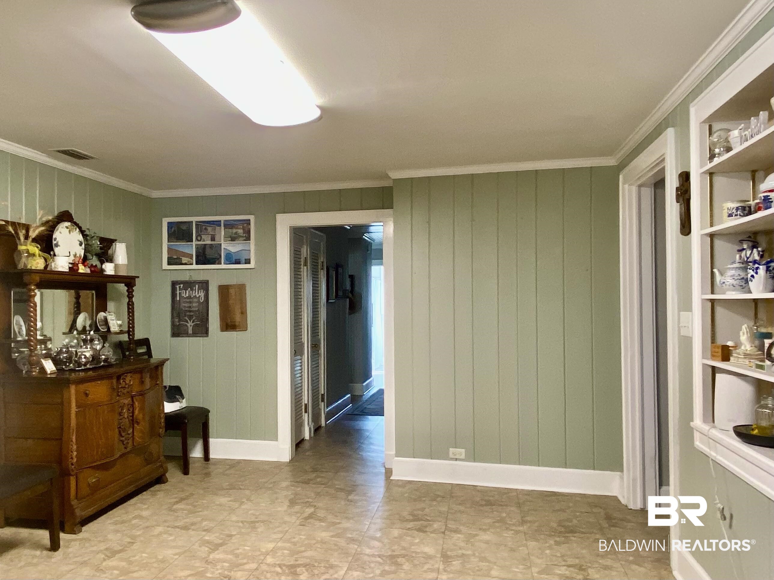 2711 County Road 5 Repton, AL 36475 - Photo 10 of 36 Interior space featuring wooden walls and crown molding