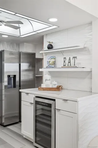 a view of washer and dryer with wooden floor