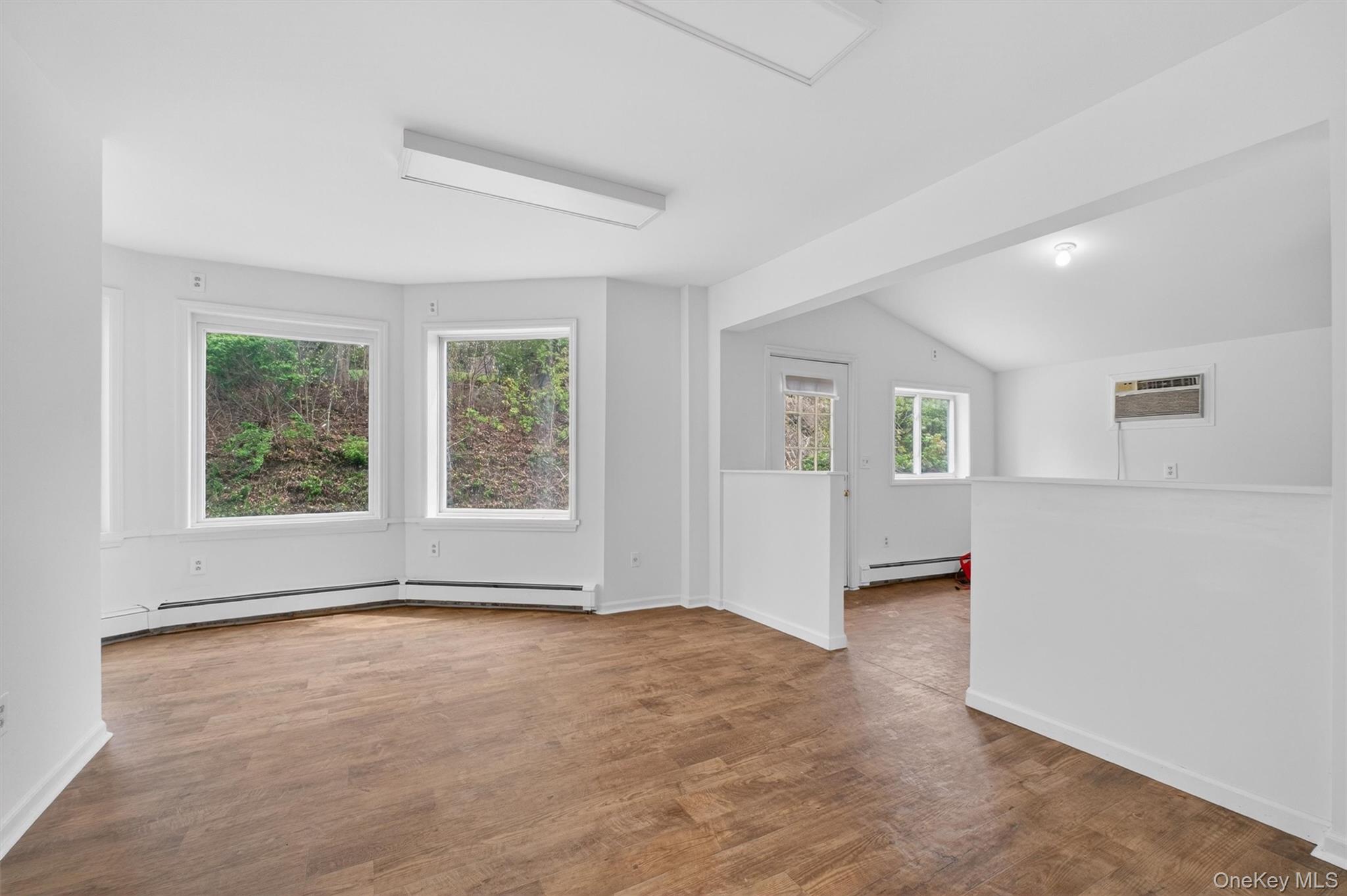 299 Peekskill Hollow Road Putnam Valley, NY 10579 - Photo 16 of 37 an empty room with windows and closet