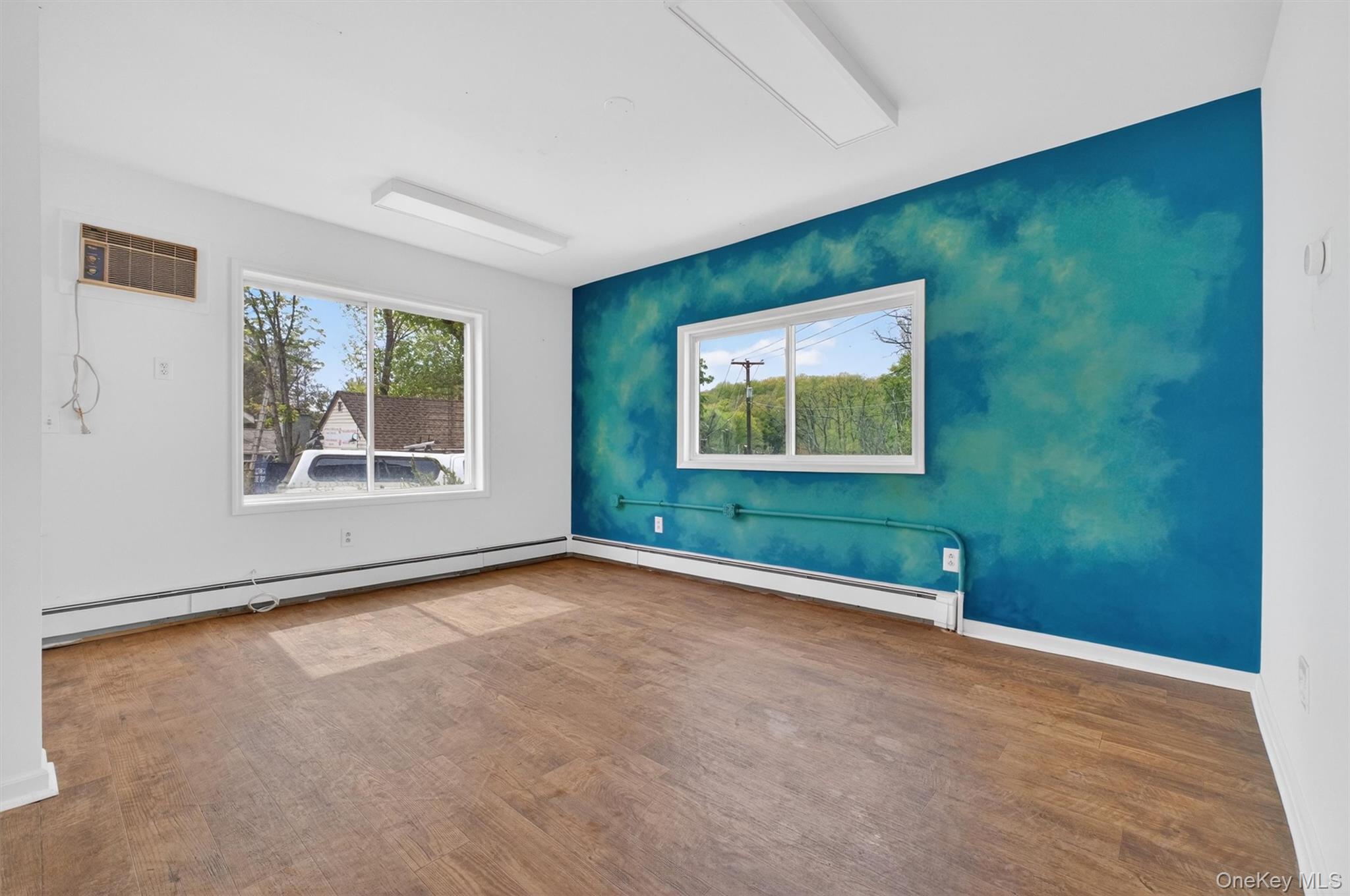 299 Peekskill Hollow Road Putnam Valley, NY 10579 - Photo 19 of 37 an empty room with windows