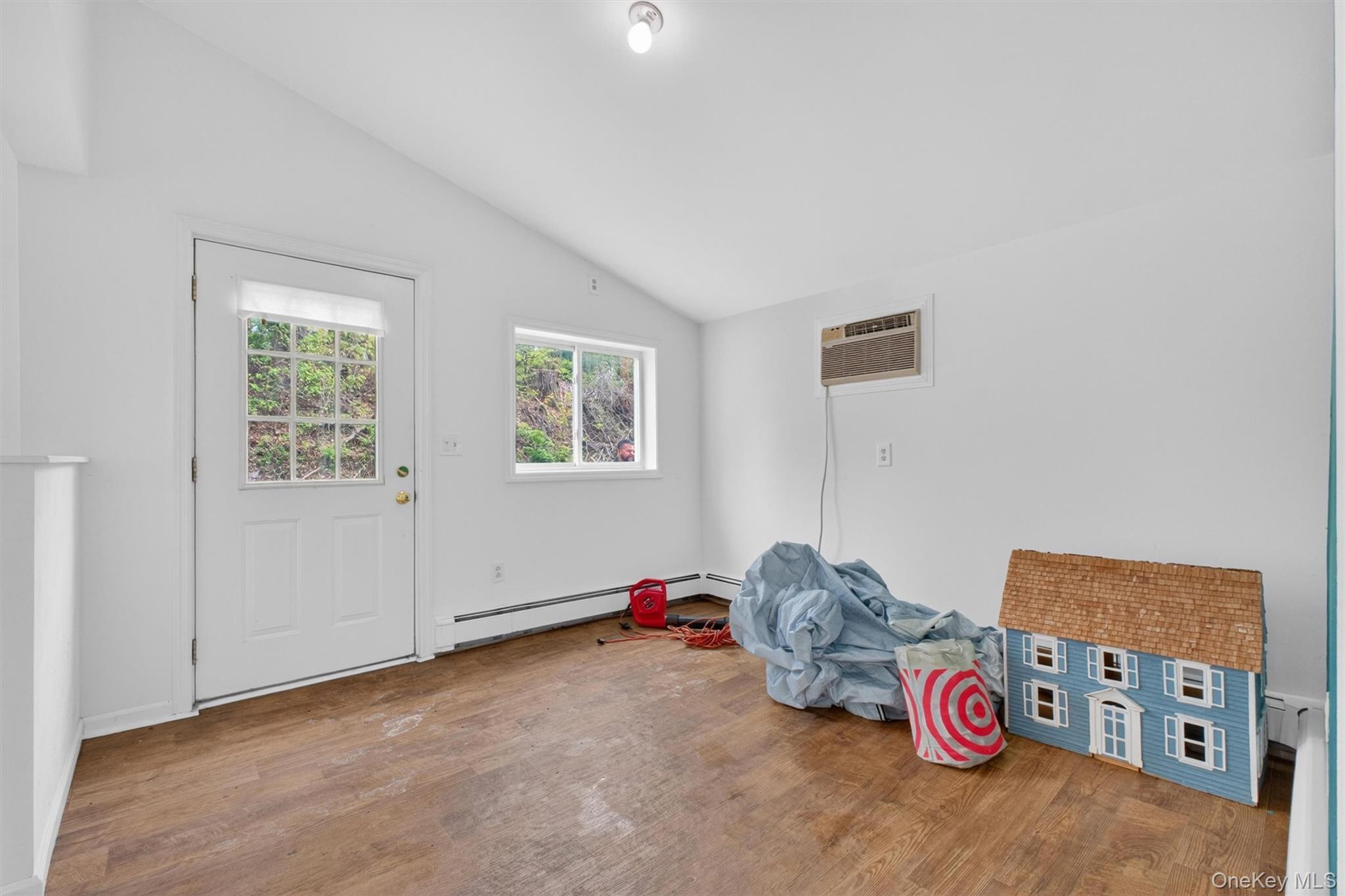 299 Peekskill Hollow Road Putnam Valley, NY 10579 - Photo 20 of 37 a bedroom with furniture and a window