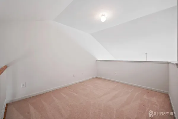an empty room with a workbench