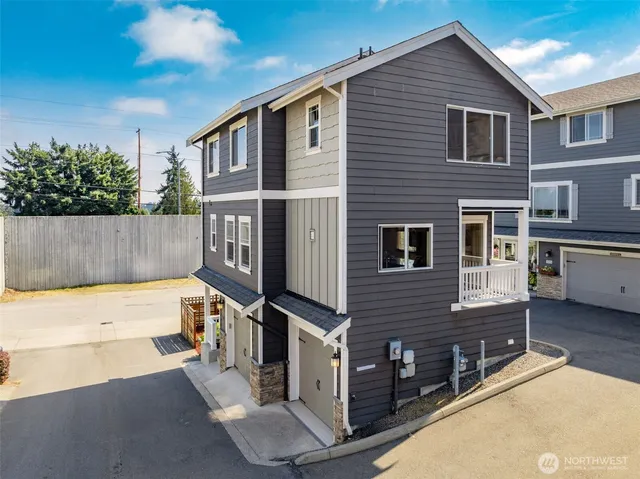 a view of a house with a large window