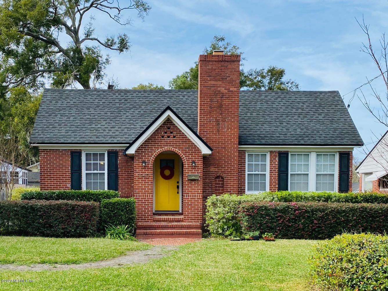 3940 Gadsden Road Jacksonville, FL 32207 - Photo 1 of 17 a front view of a house with a yard