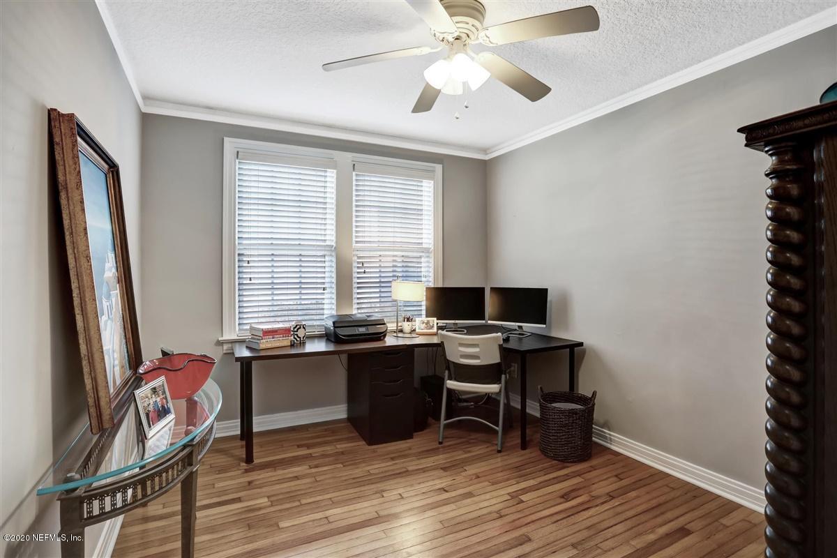 3940 Gadsden Road Jacksonville, FL 32207 - Photo 12 of 17 a view of a workspace with furniture and a window