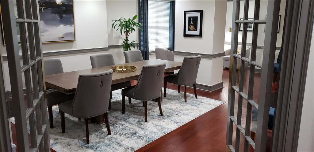 1101 Juniper Street Northeast, Unit 1416 Atlanta, GA 30309 - Photo 33 of 48 a view of a dining room with furniture