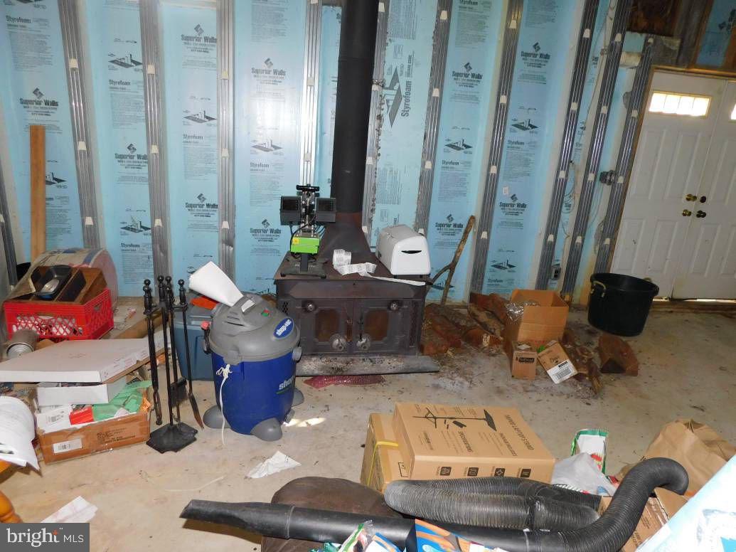 570 Garton Road Bridgeton, NJ 08302 - Photo 17 of 17 Basement: wood stove
