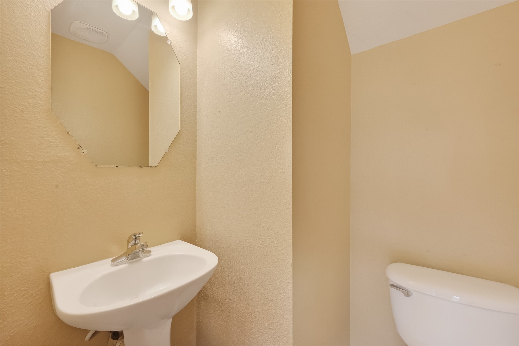 22802 Sherioaks Lane Spring, TX 77389 - Photo 13 of 37 Half Bath located on the first floor.