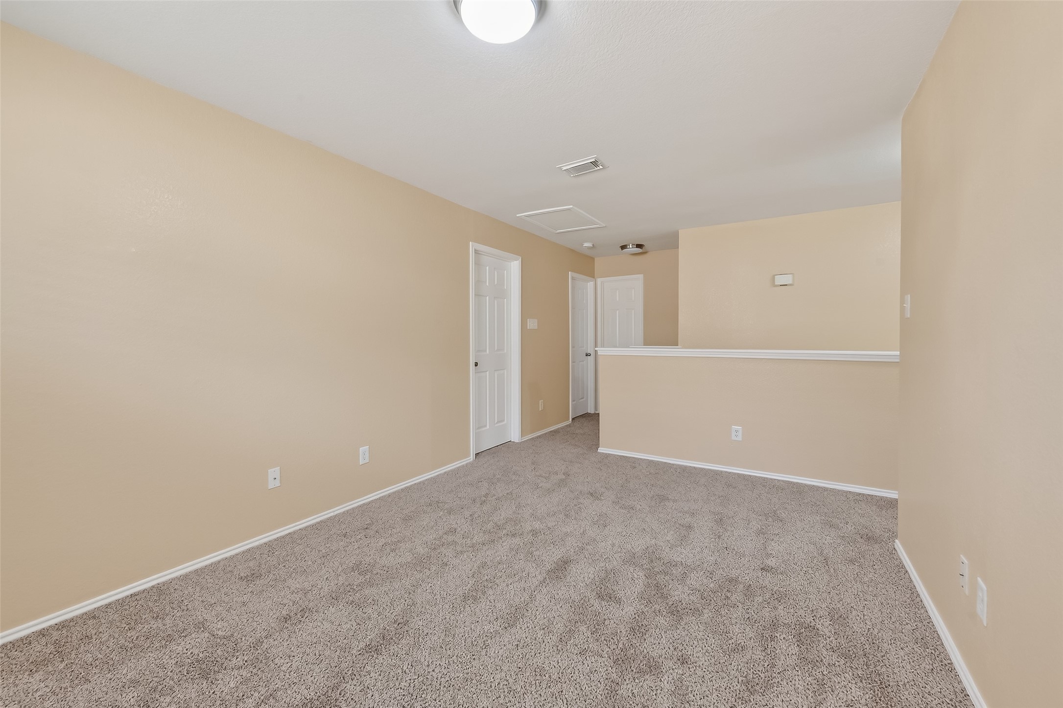 22802 Sherioaks Lane Spring, TX 77389 - Photo 22 of 37 The Spacious game room features clean carpet, neutral paint colors and wonderful space for the family.