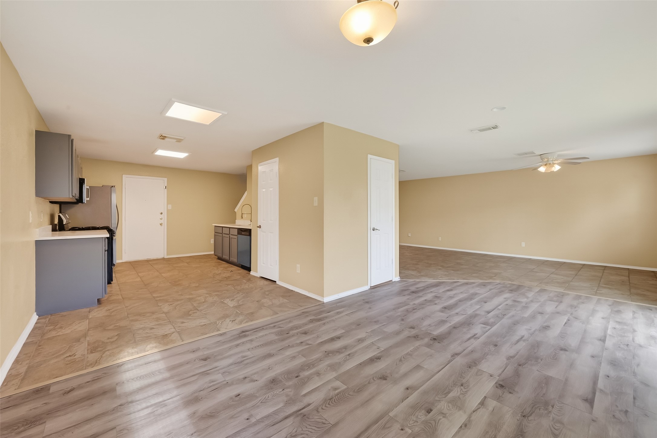 22802 Sherioaks Lane Spring, TX 77389 - Photo 3 of 37 This open concept layout perfect for entertaining and every day living. Features Laminate and Tile Floors.