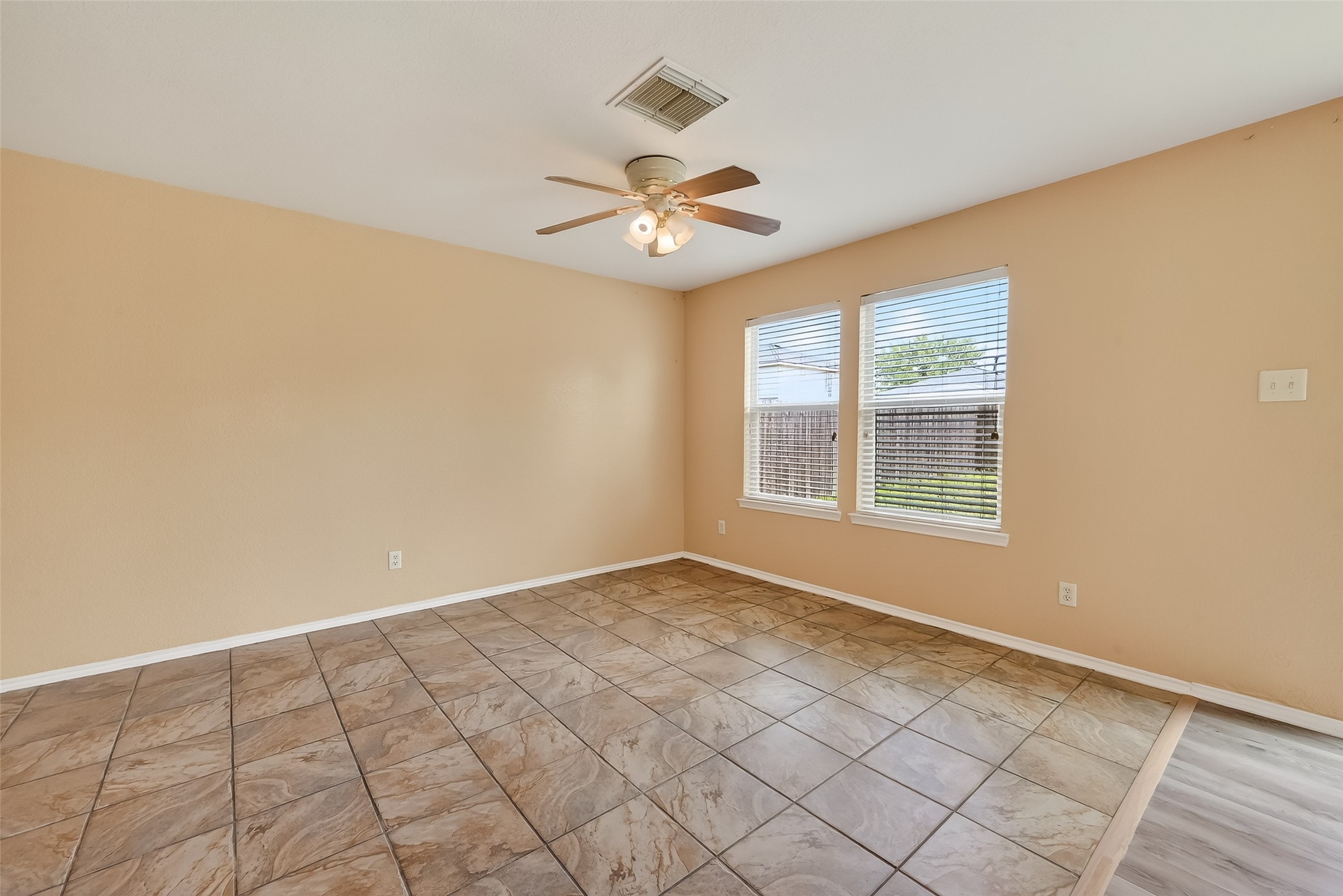 22802 Sherioaks Lane Spring, TX 77389 - Photo 10 of 37 This house features neutral paint throughout, laminate gray flooring in the breakfast area, tile flooring in the living room. Easy Maintenance and durability.