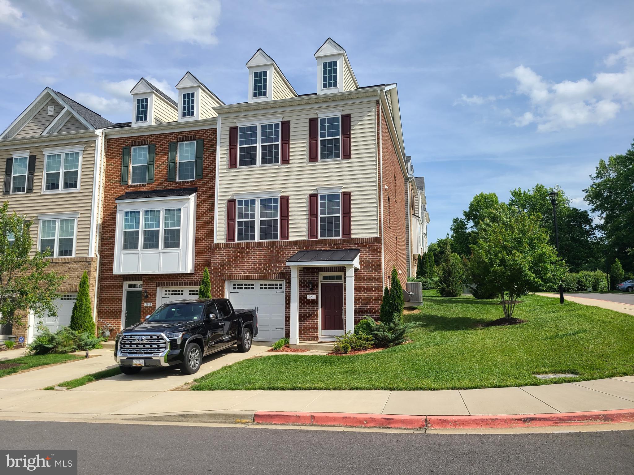 12801 Ricker Road Upper Marlboro, MD 20772 - Photo 2 of 27 a front view of a house with a yard