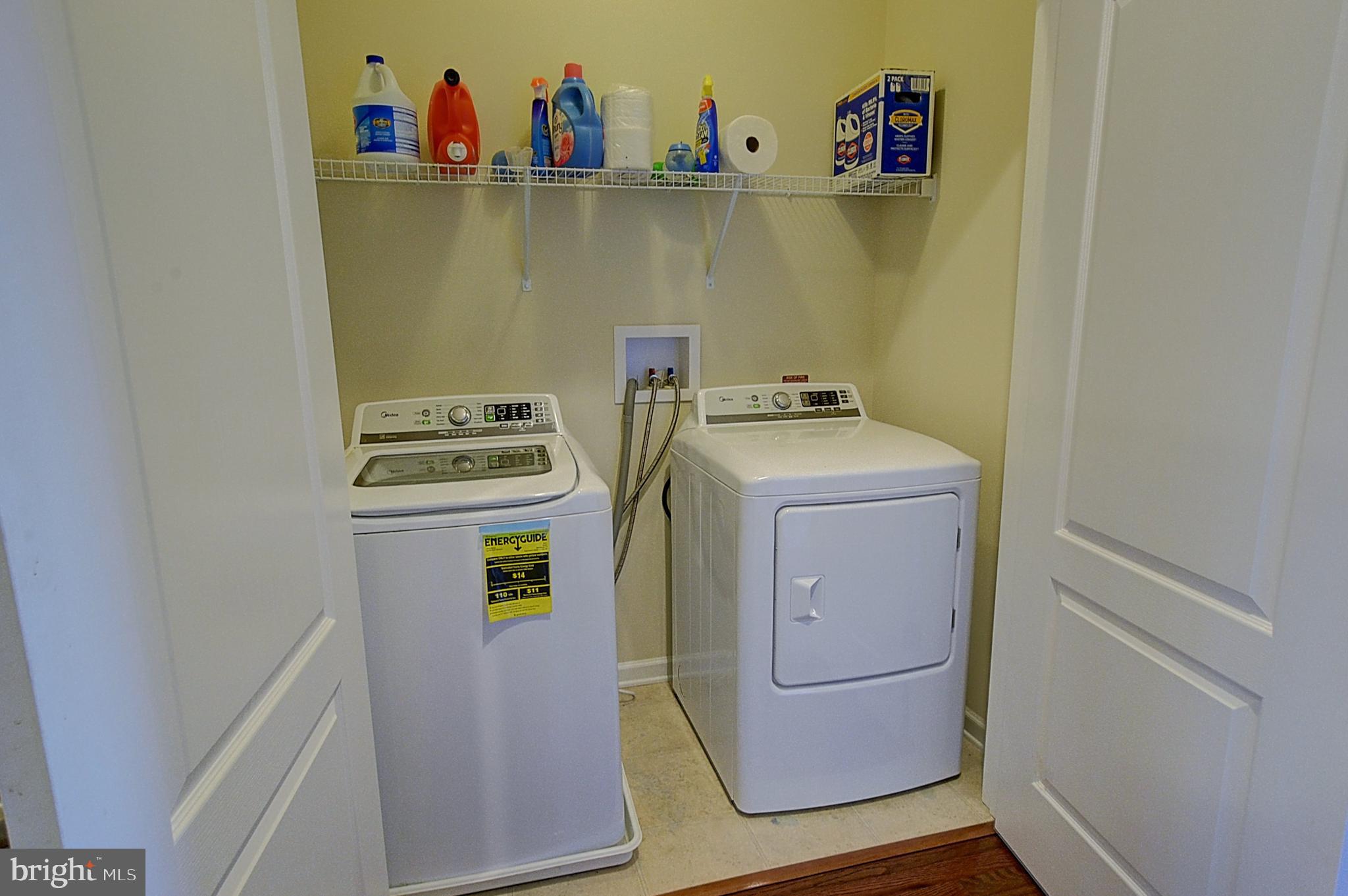 12801 Ricker Road Upper Marlboro, MD 20772 - Photo 23 of 27 a utility room with dryer and washer