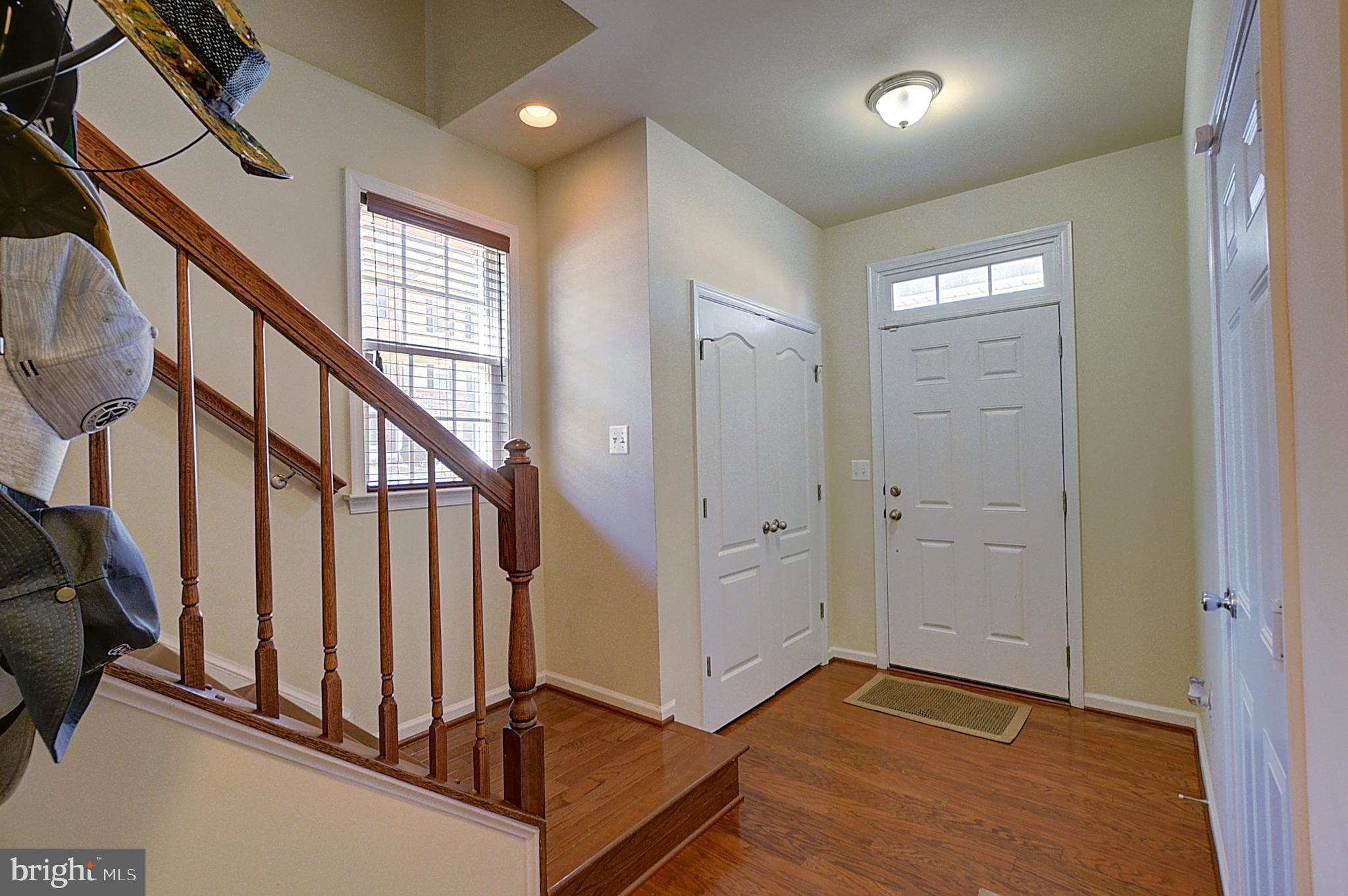 12801 Ricker Road Upper Marlboro, MD 20772 - Photo 3 of 27 en view interior of a house with wooden floor and stairs