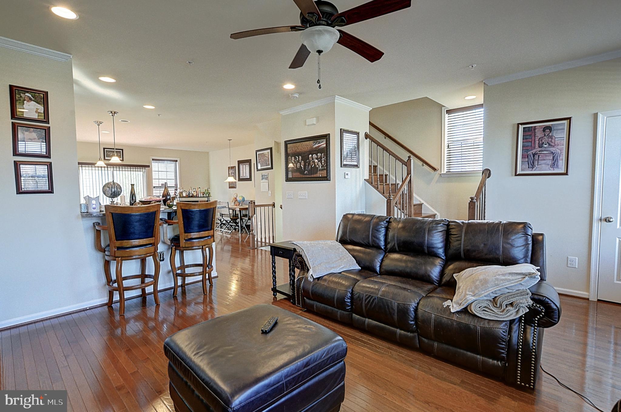12801 Ricker Road Upper Marlboro, MD 20772 - Photo 6 of 27 a living room with furniture and wooden floor