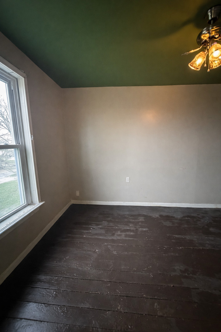 218 South Ida Street Lacon, IL 61540 - Photo 8 of 8 a view of an empty room with a window