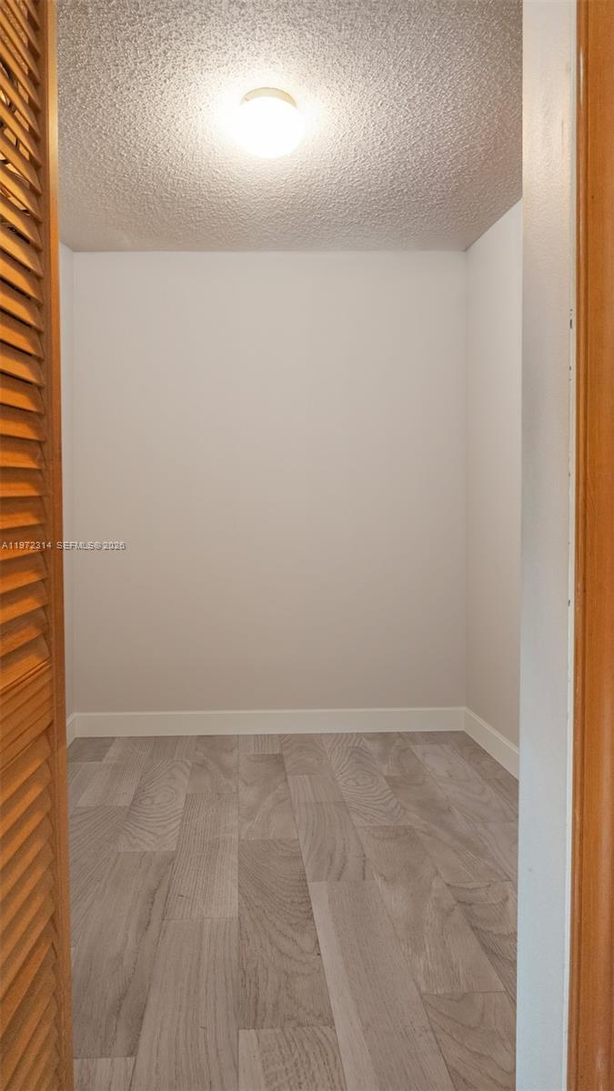 8605 West Sample Road, Unit 202 Coral Springs, FL 33065 - Photo 11 of 26 a view of an empty room