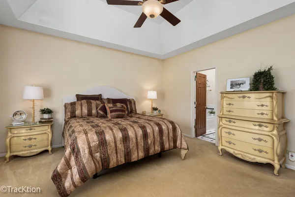 a bedroom with a bed and a cabinets