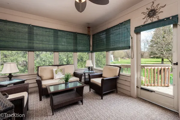 a outdoor living space with furniture and a garden
