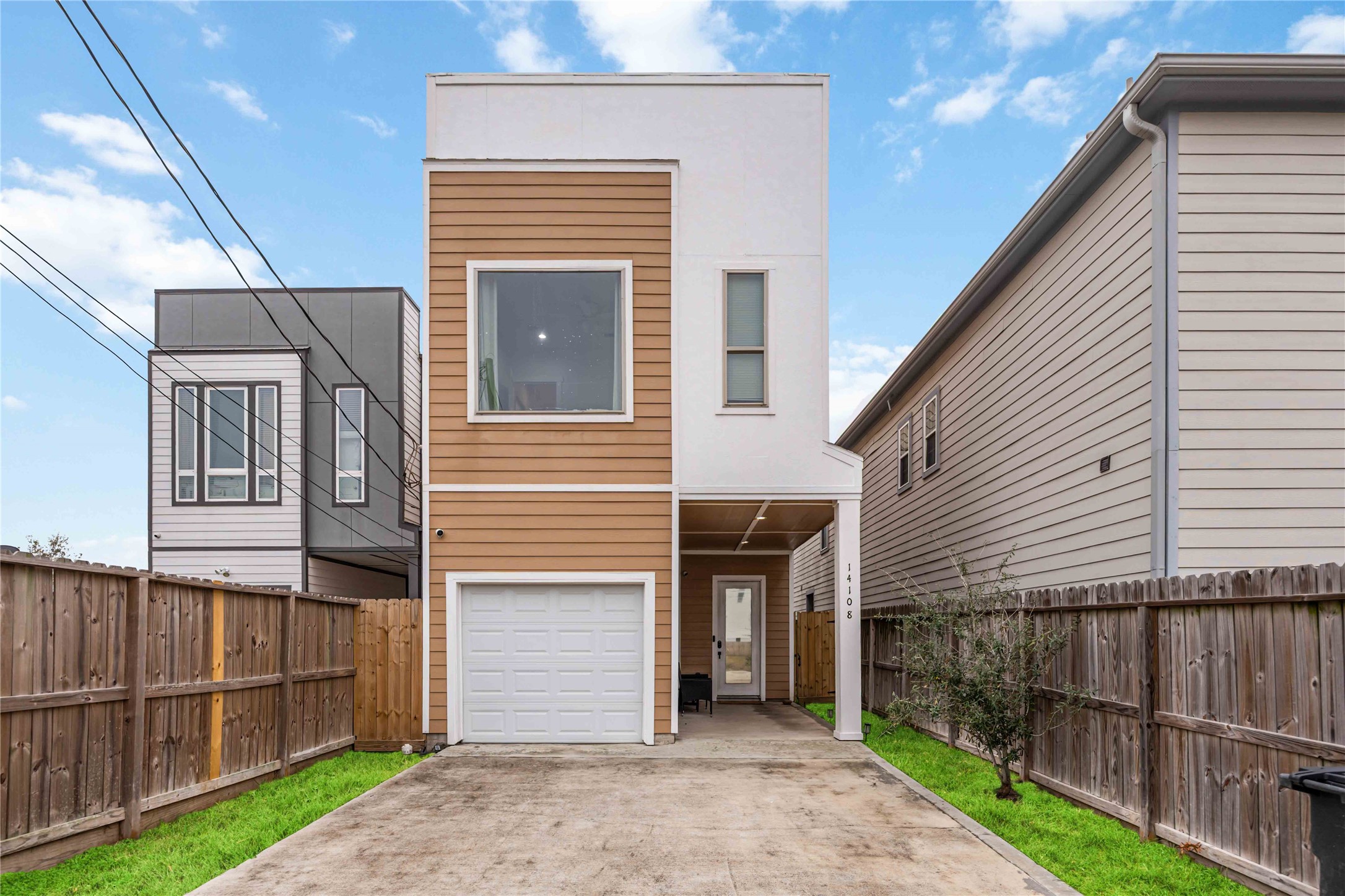14108 Bridgeport Road, Unit B Houston, TX 77047 - Photo 2 of 24 a front view of a house with a yard